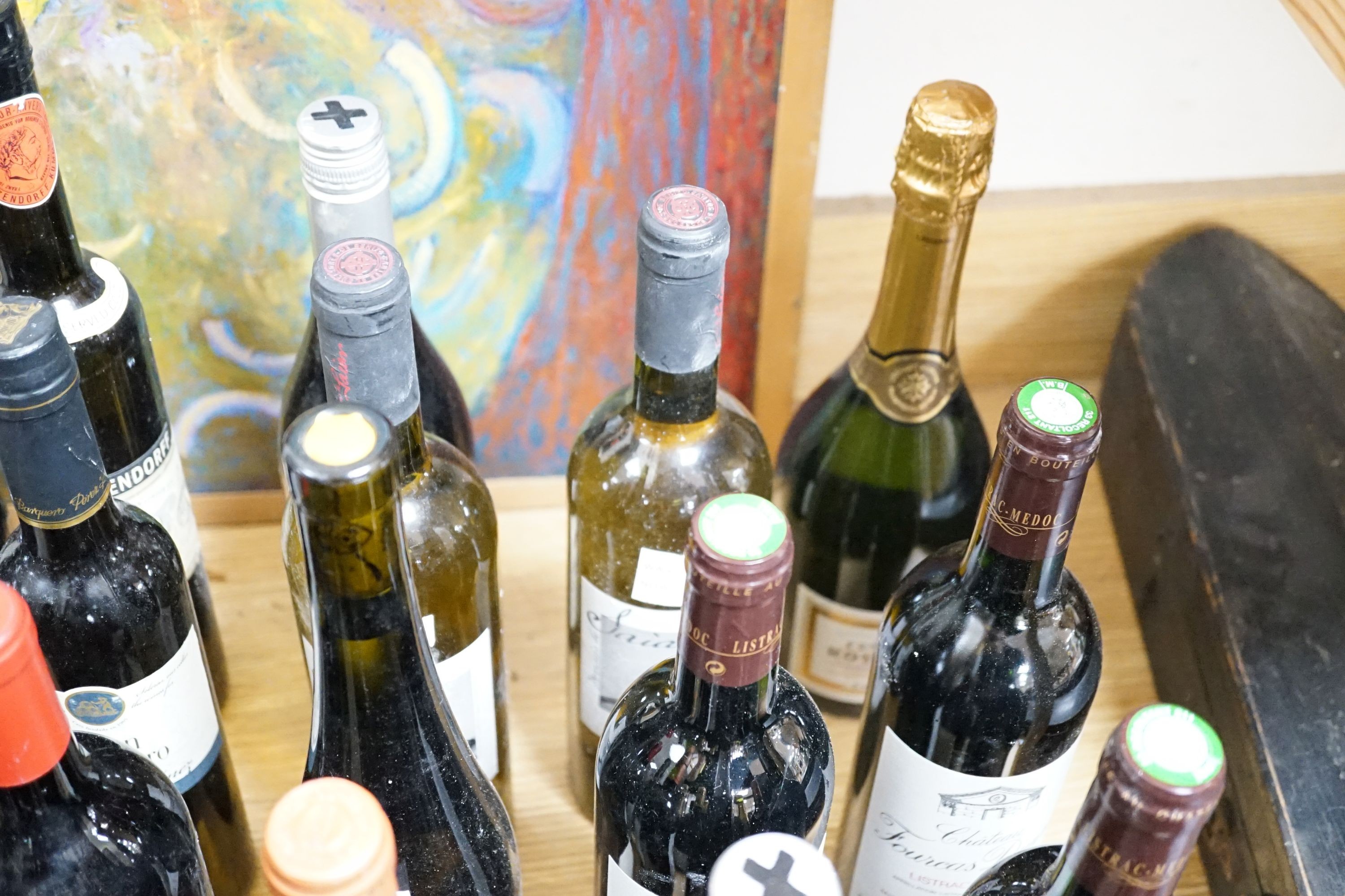 Twenty nine assorted bottles of wine is etc. including Les Tourelles de Longueville, 2003, Chateau Fourcas Dupre, 2000, Perrier Jouet Grand Brut Champagne, Chateau Sigognac, 1985 and Cote Rotie, 2001.